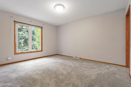 Primary bedroom with large closet that connects to the bathroom