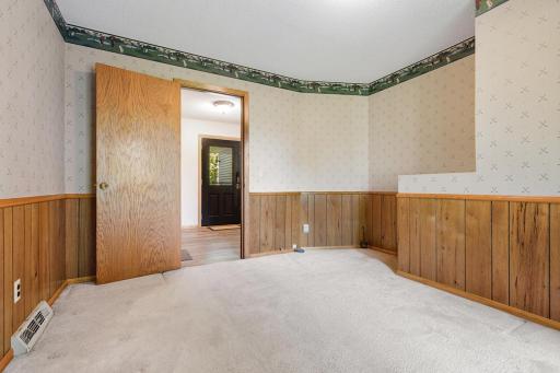 Fantastic main floor office/playroom/flex space with views of the backyard!
