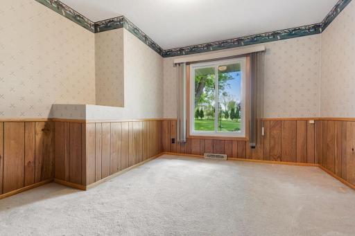 Fantastic main floor office/playroom/flex space with views of the backyard!