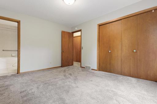 Primary bedroom with large closet that connects to the bathroom