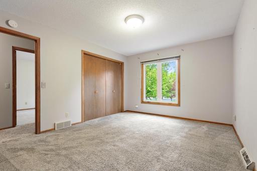 Primary bedroom with large closet that connects to the bathroom