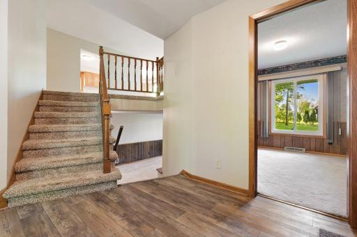 Spacious front foyer space that leads you into the main floor office/playroom/flex space