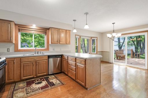 Great flow throughout tying the kitchen/dining and living room all together and leading you to your outdoor deck oasis