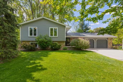 Perfectly nestled on 0.63 breathtaking acres in the coveted Douglas Drive neighborhood, this spacious 4-bedroom, 2-bathroom Buffalo home offers 2,267 finished square feet of beautifully designed living space paired with an incredible park-like yard!