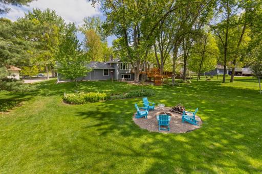 Look at this backyard space!!! So serene and private with mature trees.