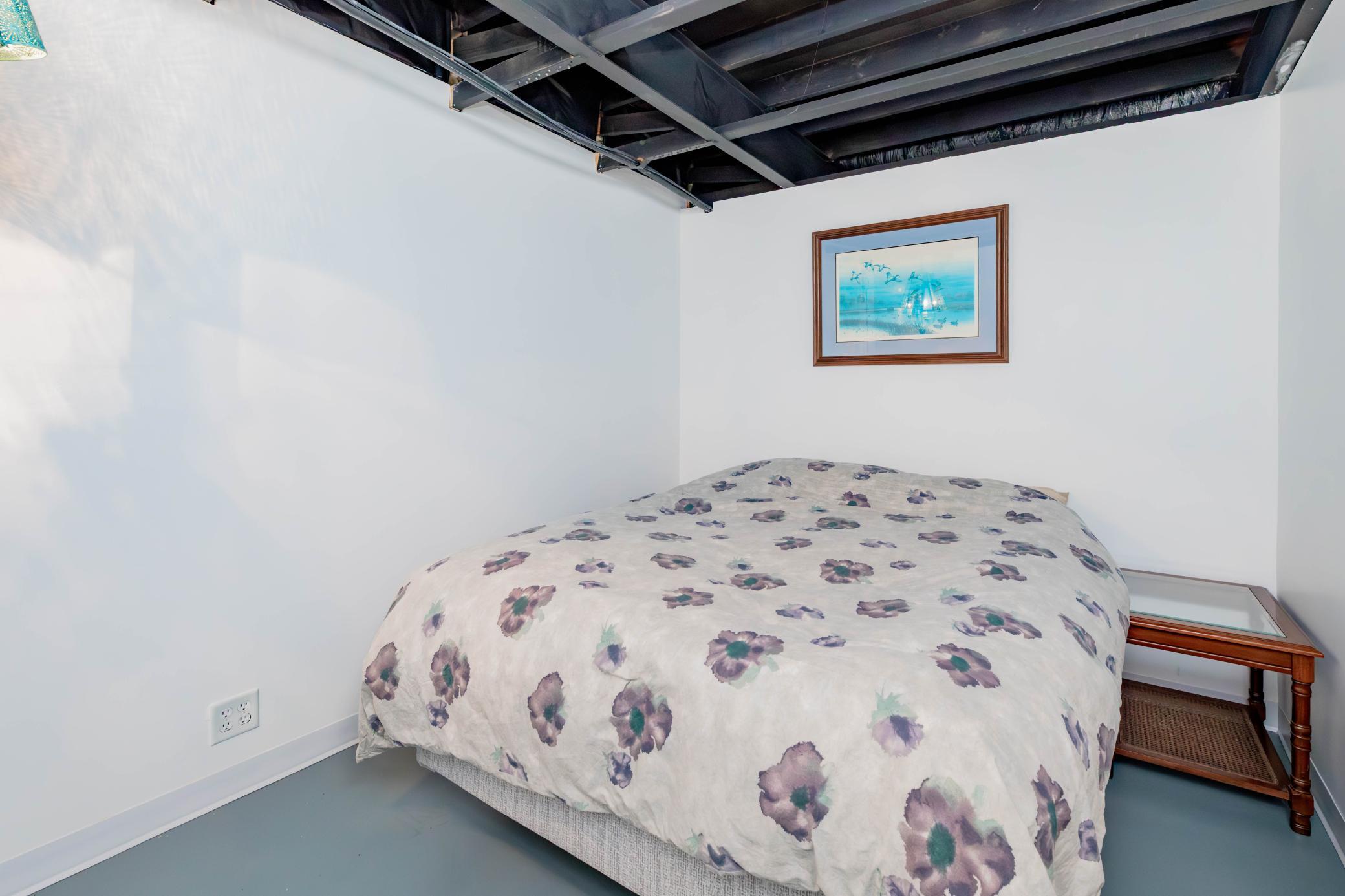 Second non-conforming lower level sleeping room