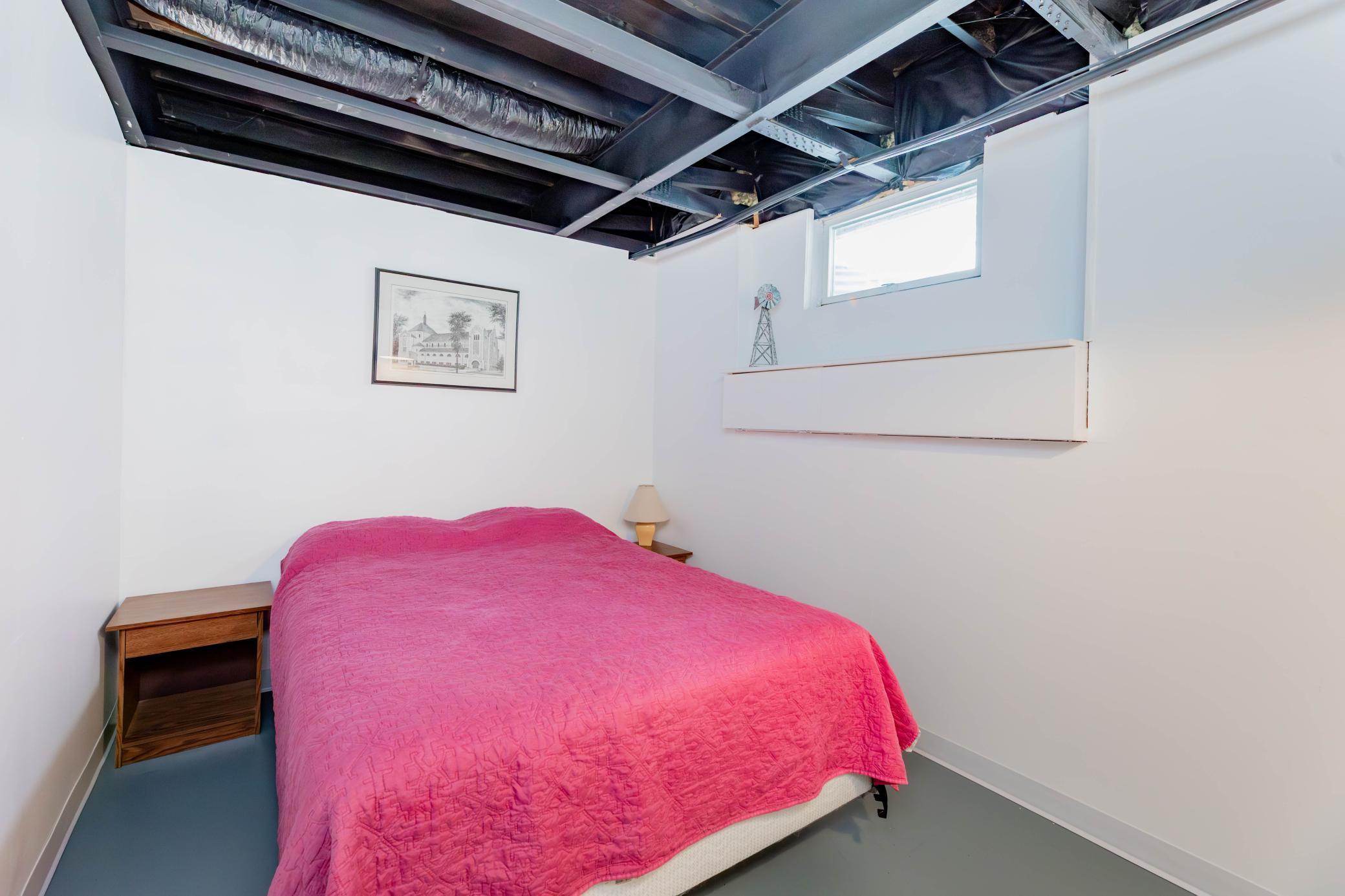 First lower level non-conforming sleeping room