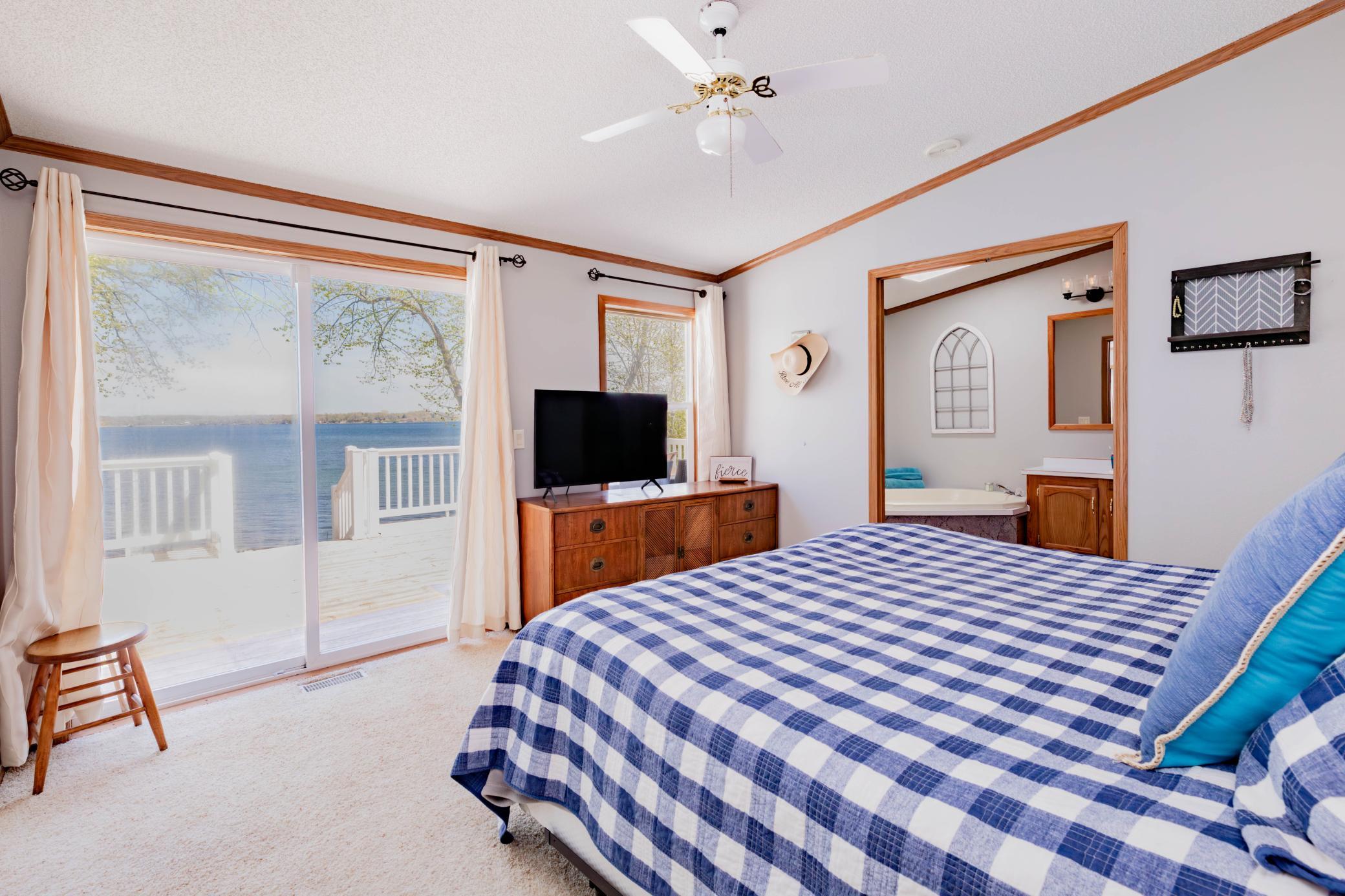 Primary bedroom overlooking lake