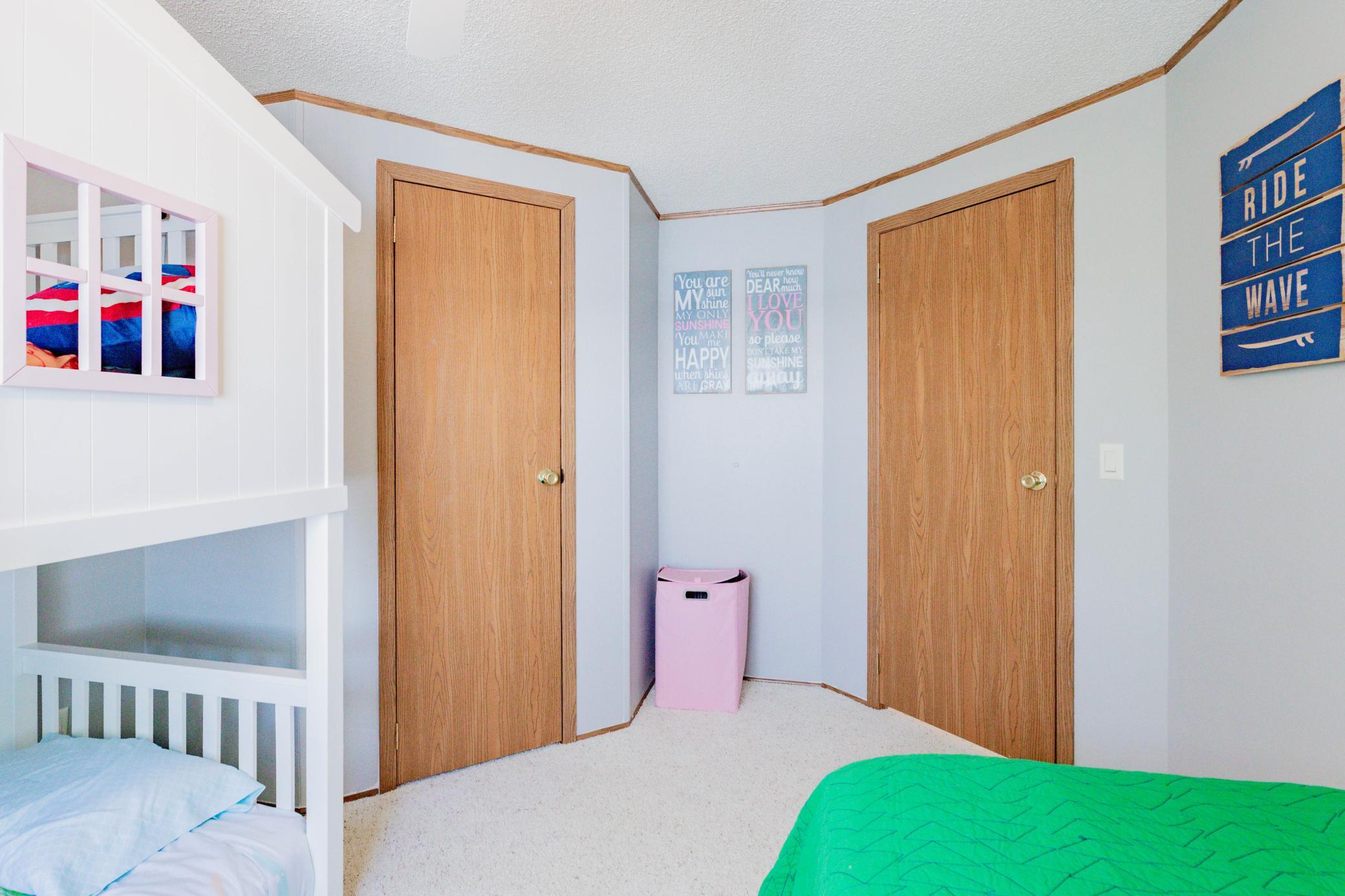Main floor third bedroom with walk-in closet