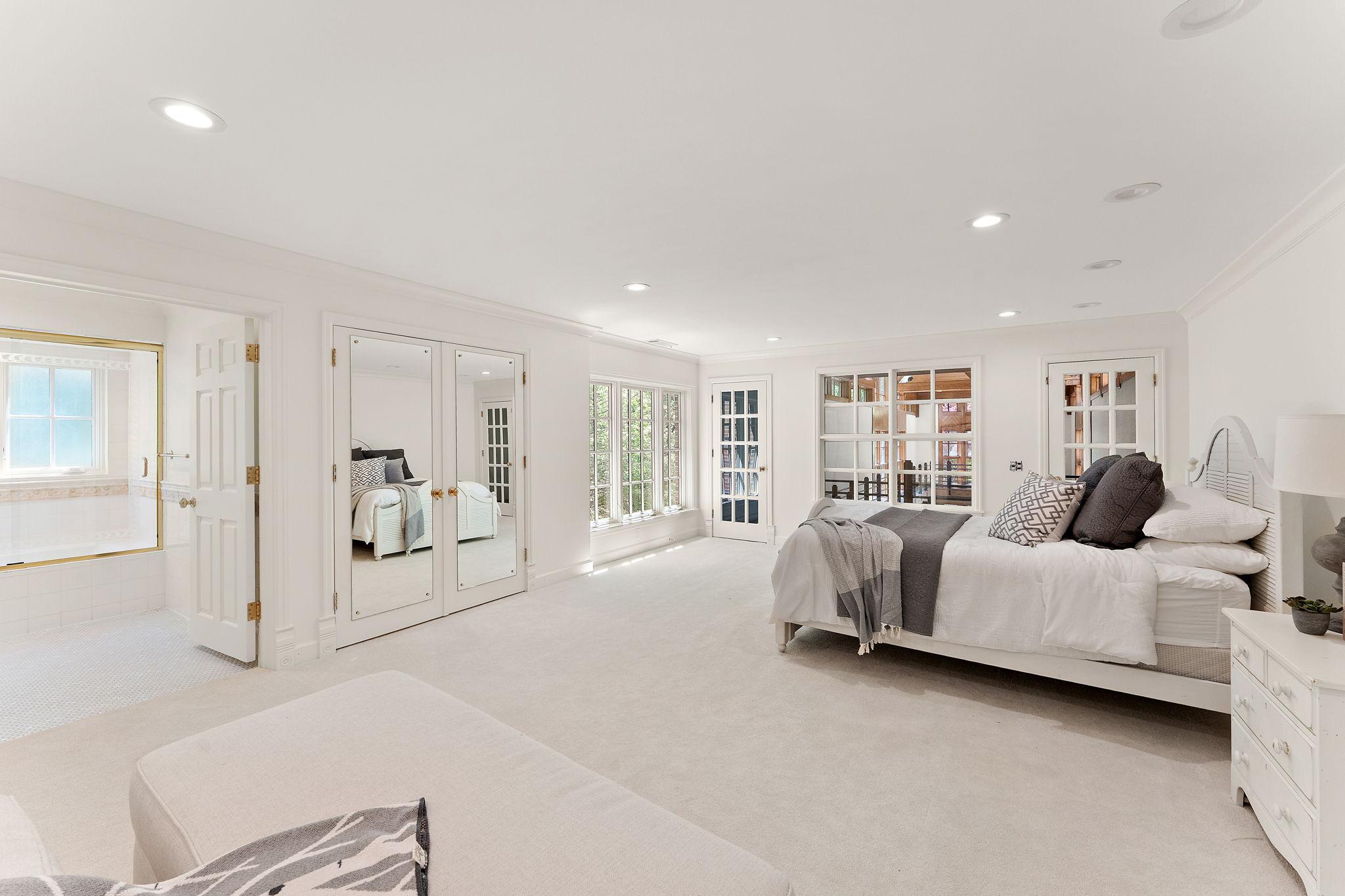 Complete with private bath and access to catwalk above pool!