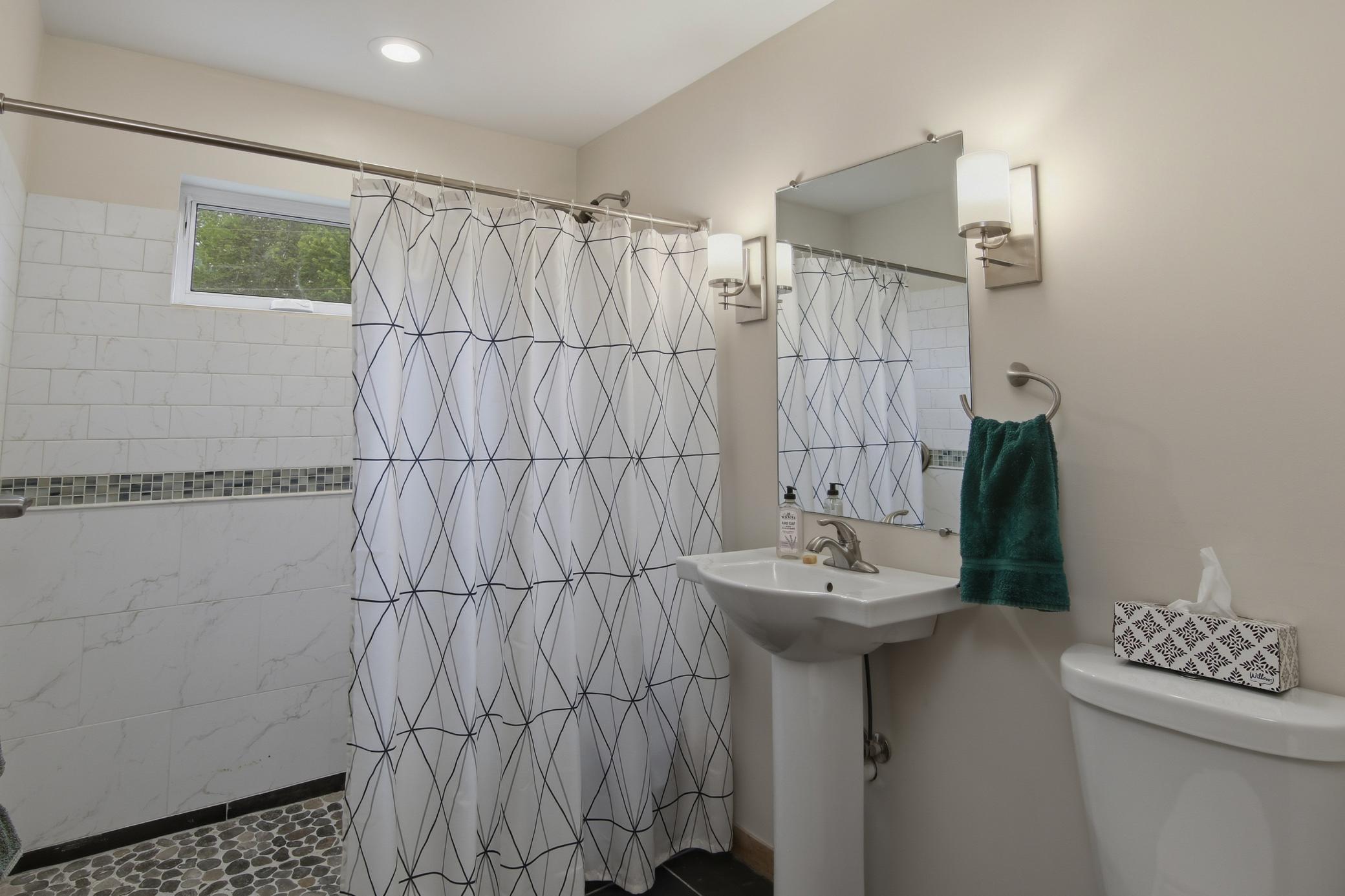 Second bath with shower.