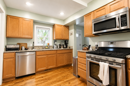 Modern kitchen with stainless appliances.png