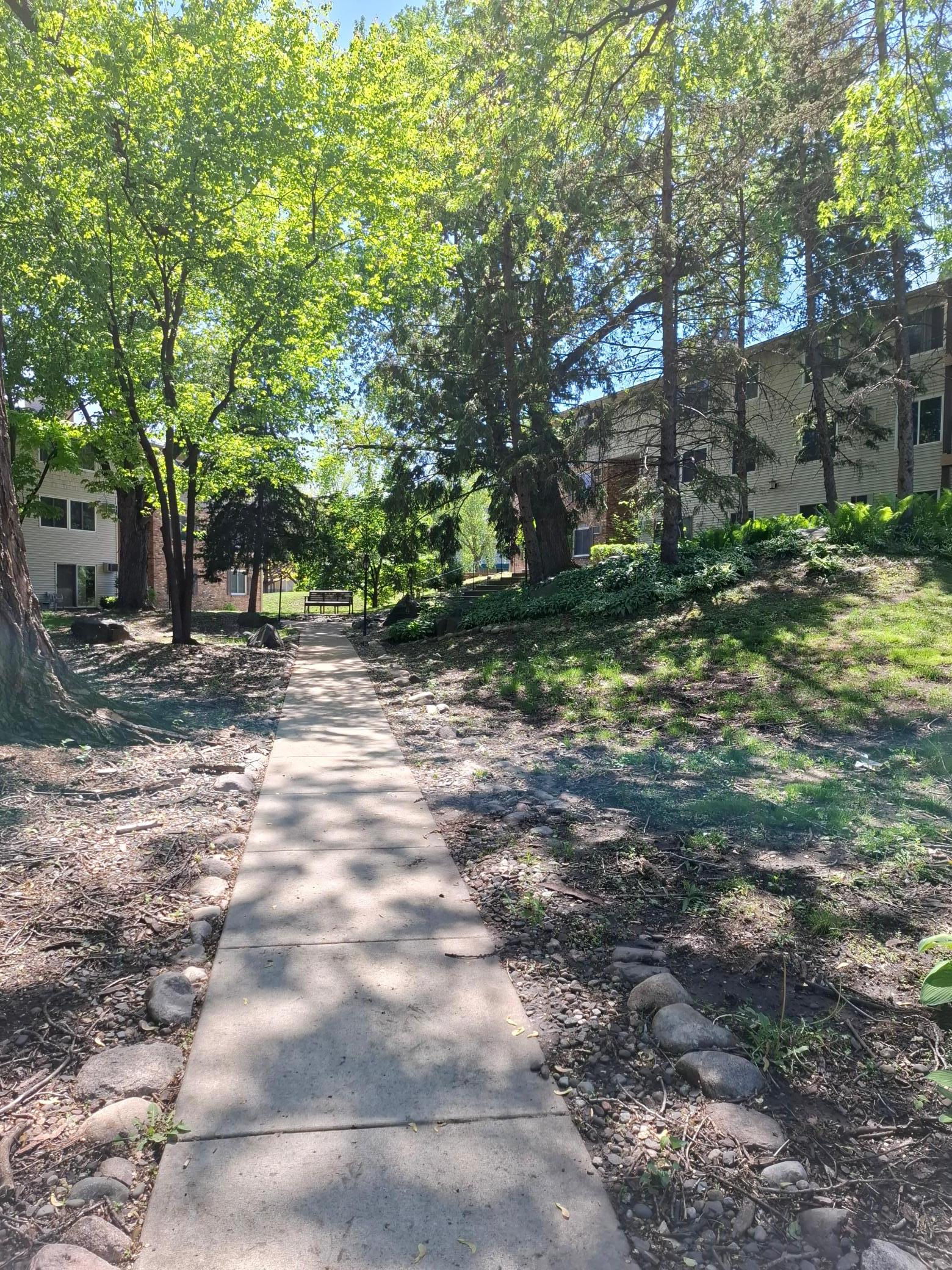 Beautiful, mature grounds with quiet seating areas.