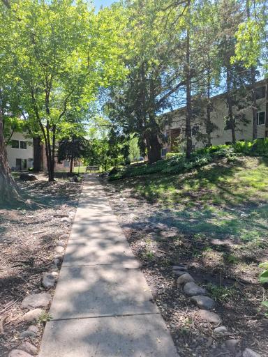 Beautiful, mature grounds with quiet seating areas.