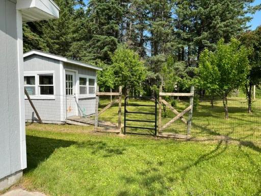 Entry to orchard with greenhouse
