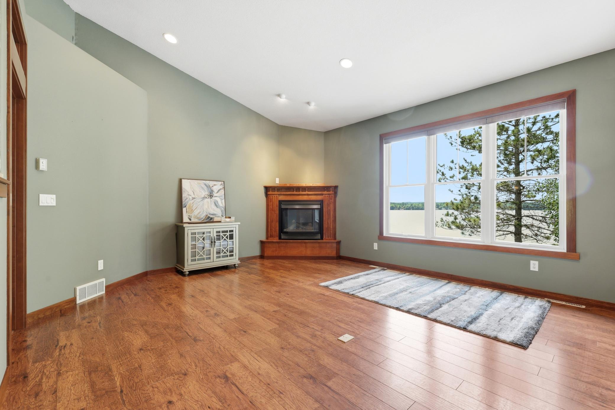 Upper Living Room Area; Views to Lake with Fireplace