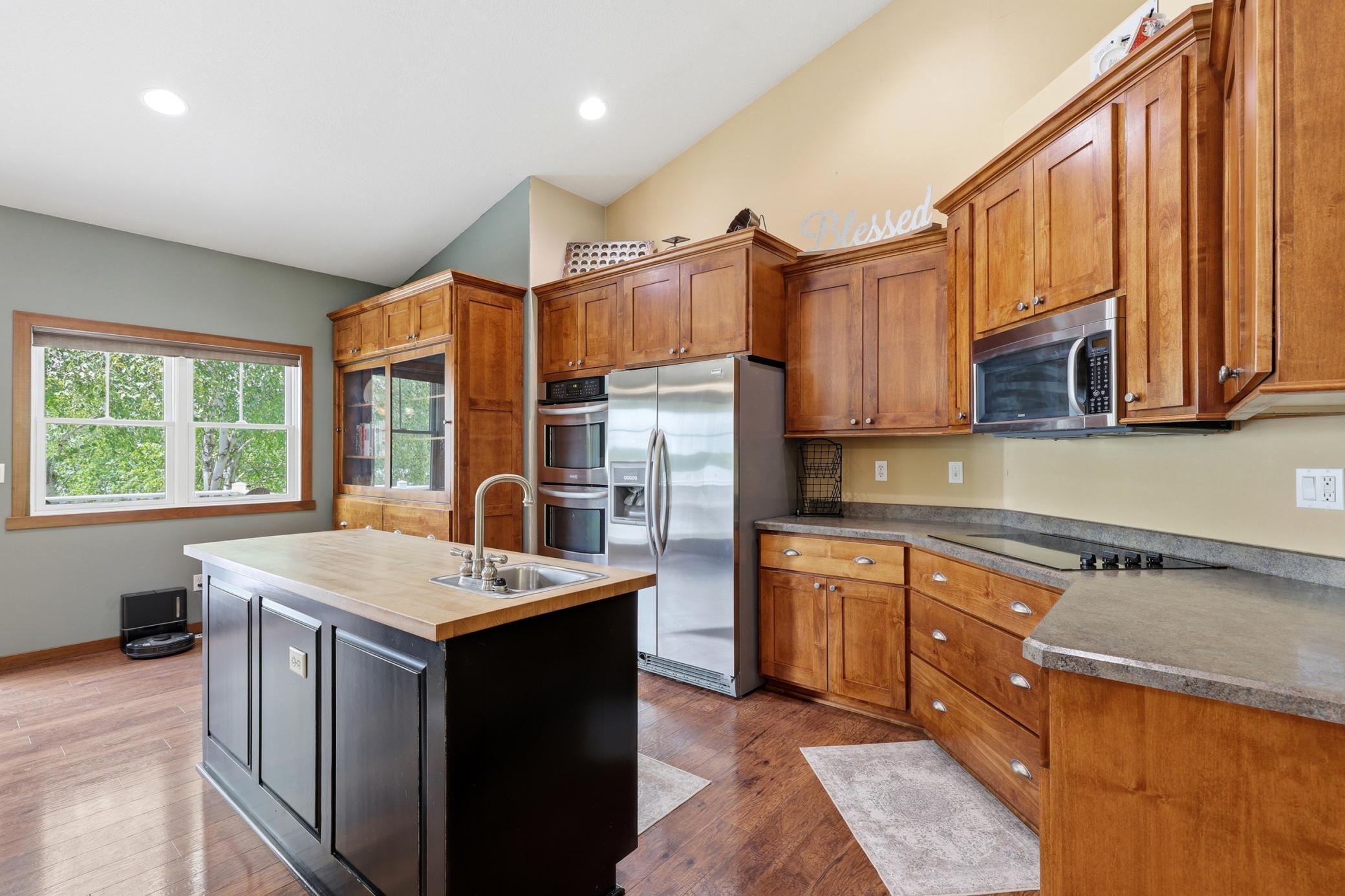 Views to the Beautiful Custom Cabinetry w/Stainless Steel Appiances