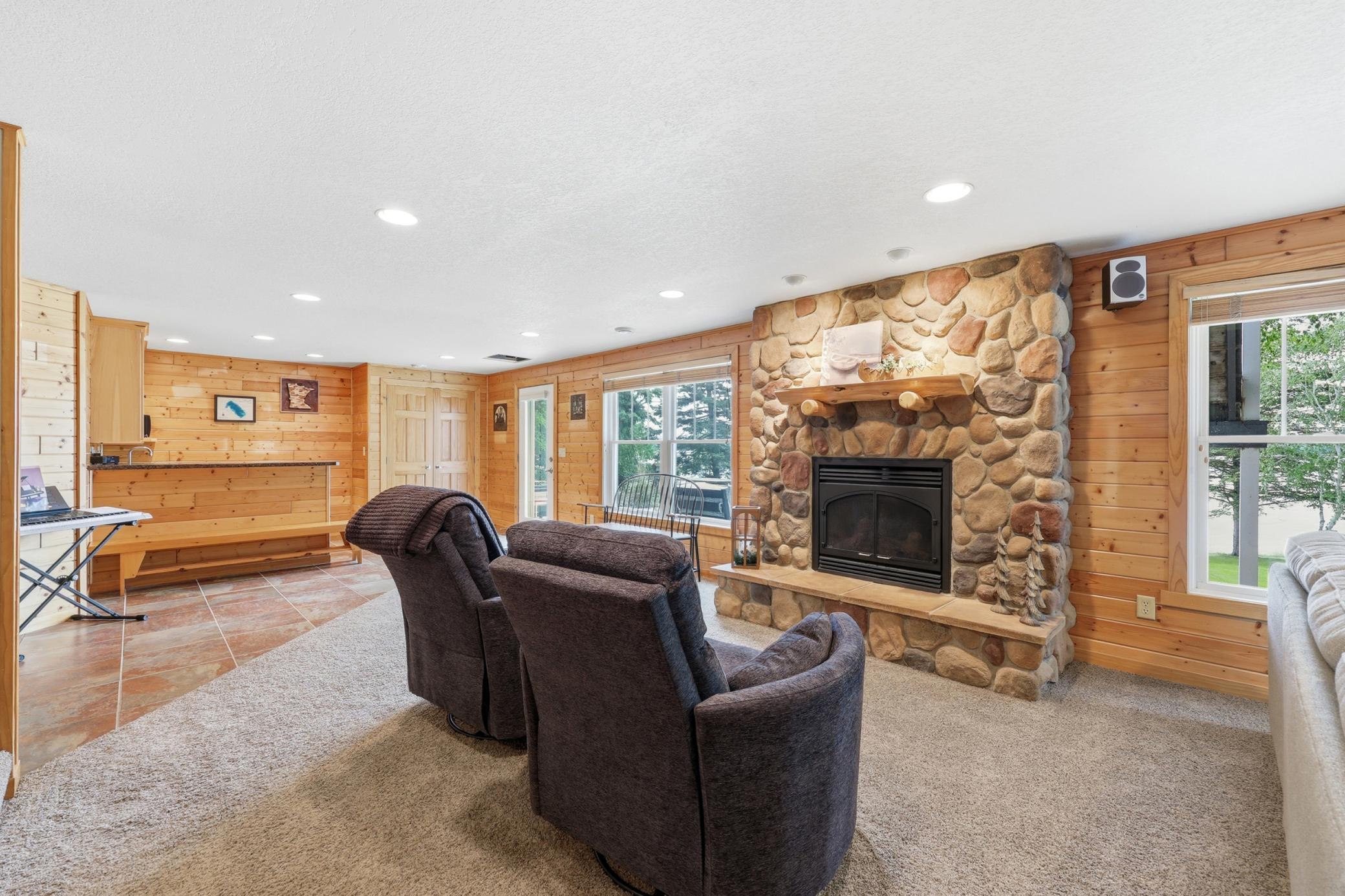 Cozy Gas Fireplace in Family Room overlooking lake