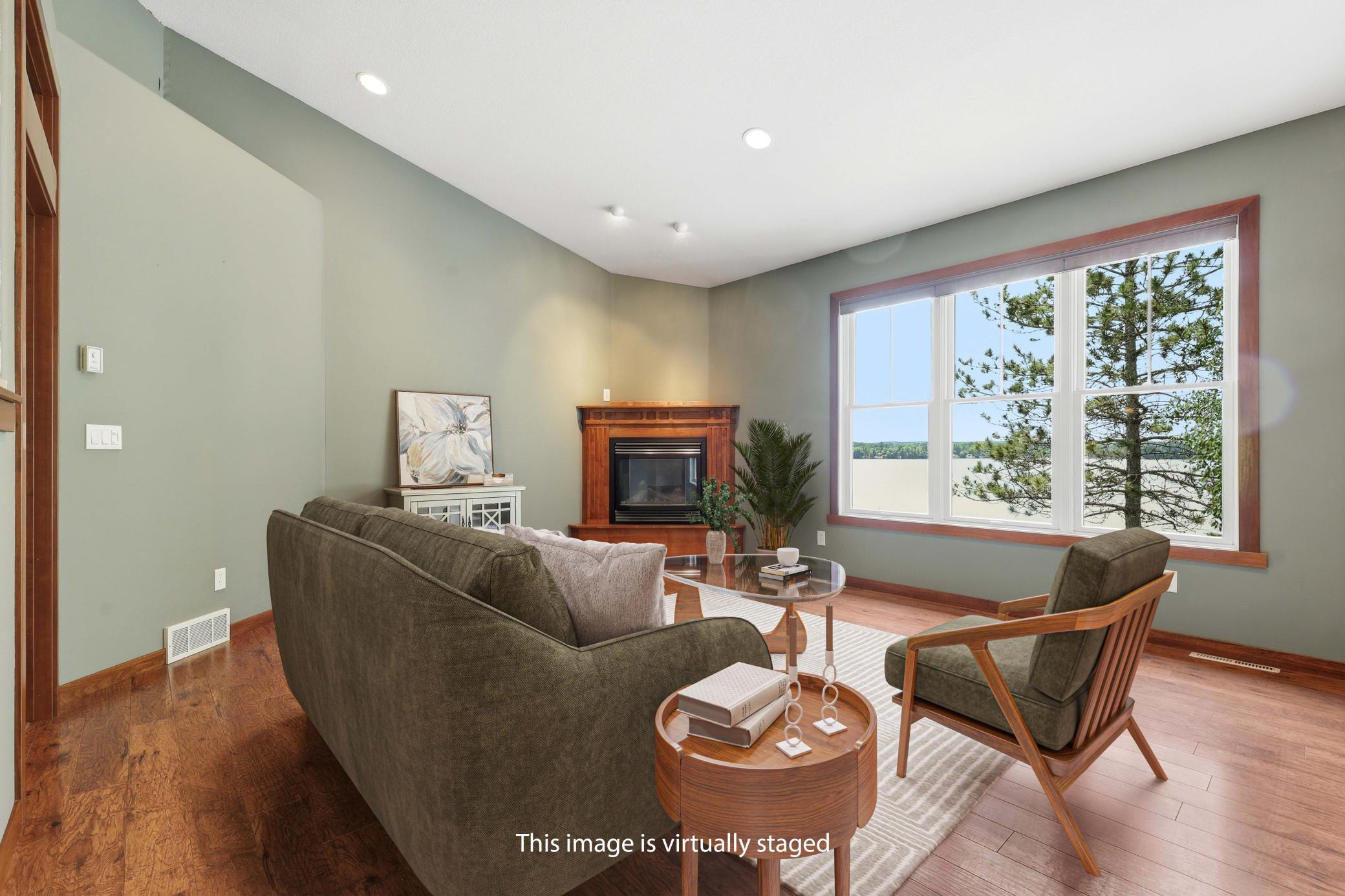 Upper Living Room Area; Views to Lake with Fireplace