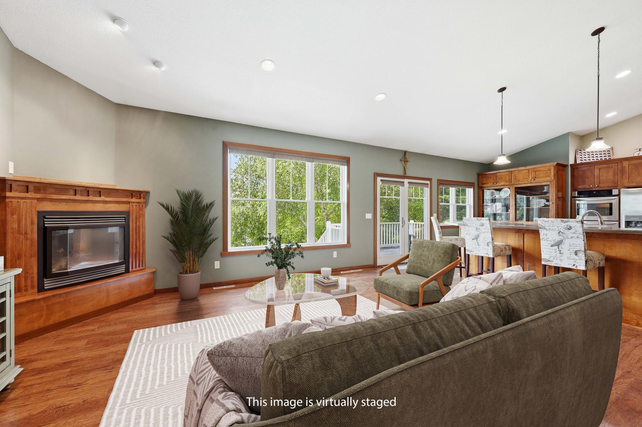 Upper Living room view to Kitchen & Lakefront Access to Deck