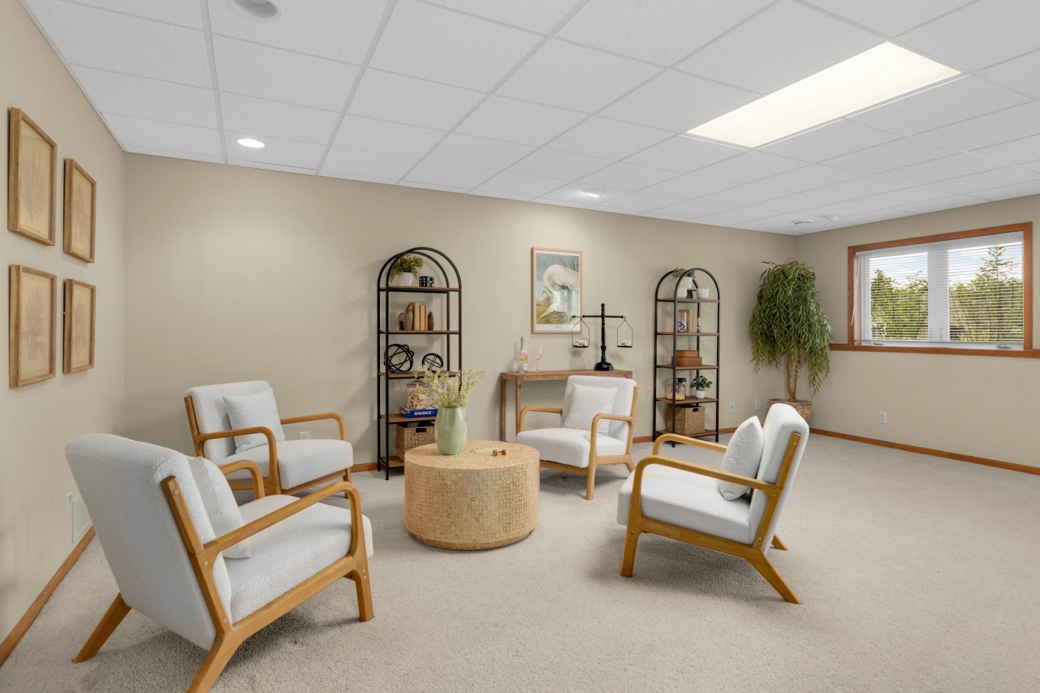 Cozy and comfortable, the lower-level family room adds extra space to spread out