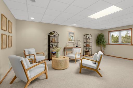 Cozy and comfortable, the lower-level family room adds extra space to spread out