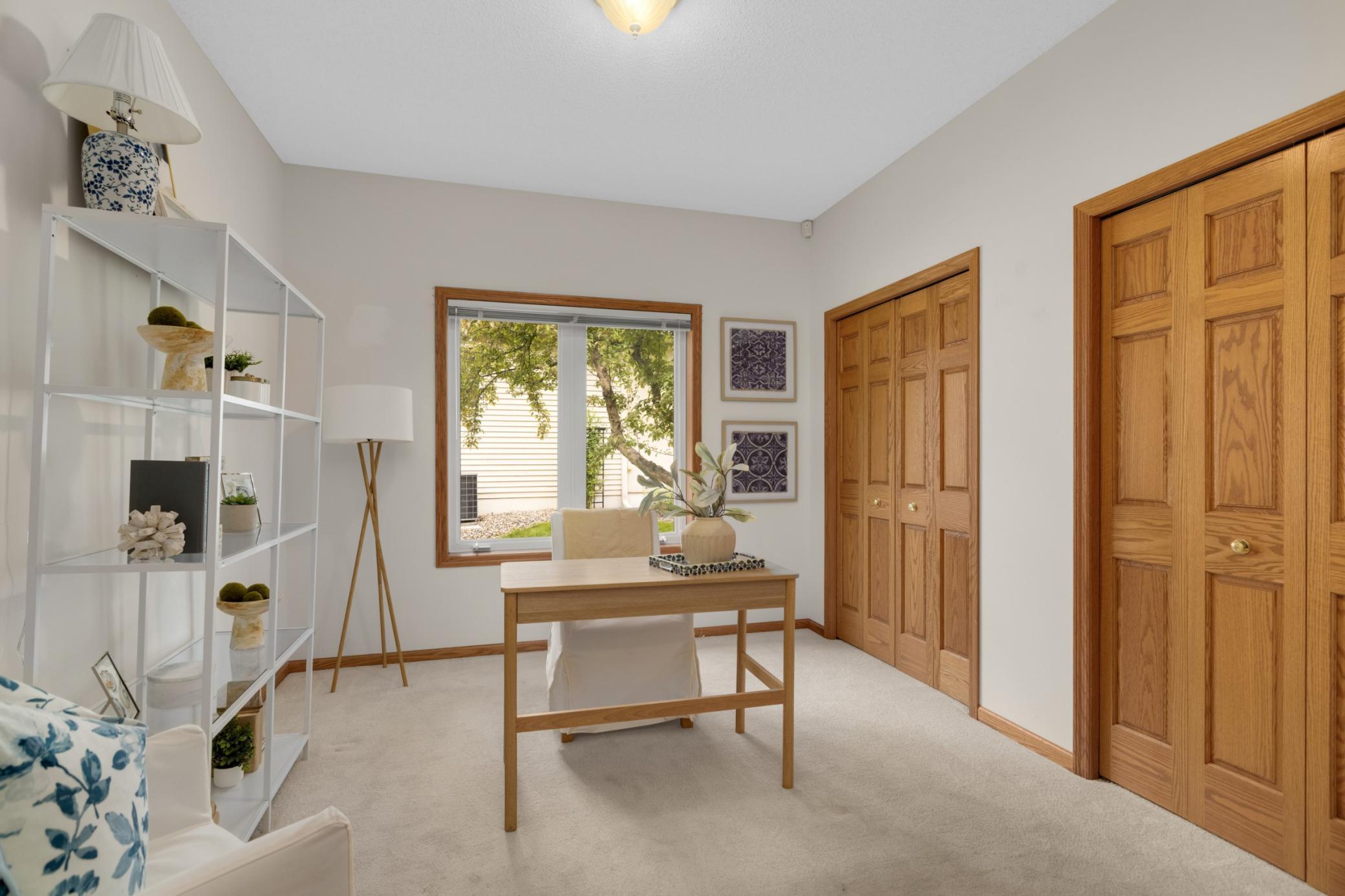 The second bedroom offers the perfect space for a home office, guest room, or flex space