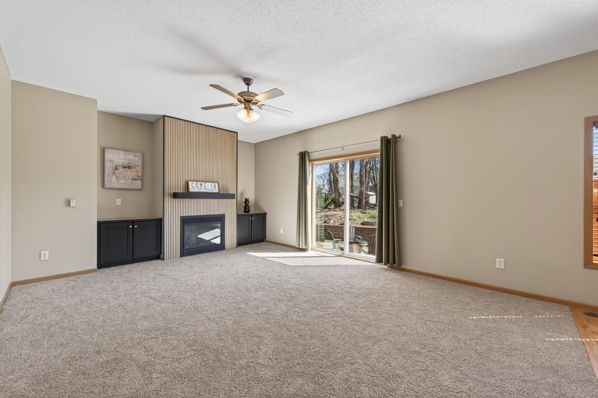 cozy gas fireplace, walkout to patio