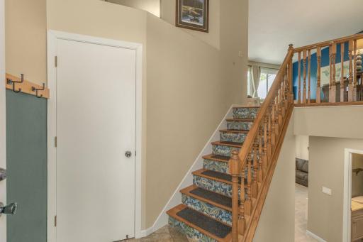 Entry offers convenient storage and is light and bright.