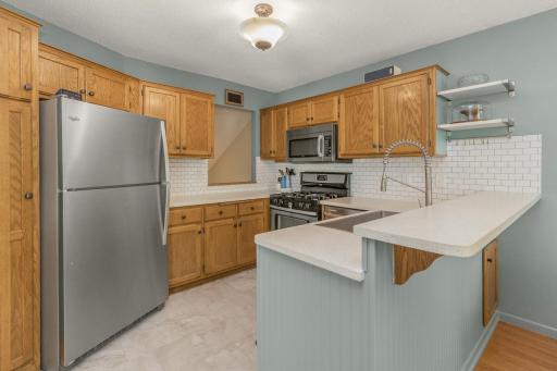 Another look at the kitchen and dining spaces.