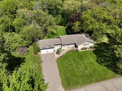 Rare .5-acre wooded lot in Minnetonka Schools! This charming one-level home offers a private backyard, mature trees, & local wildlife. Feel an instant sense of calm in this city-side nature retreat. Experience the peace of nature w/city convenience.