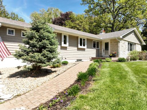 This home's amazing curb appeal is just the beginning. Step inside to luxury.