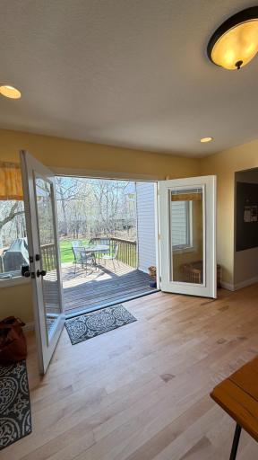 The ultimate gateway to green. Blurring the lines between cozy indoor comfort and our private wooded sanctuary. Every day feels like a breath of fresh air with this view.