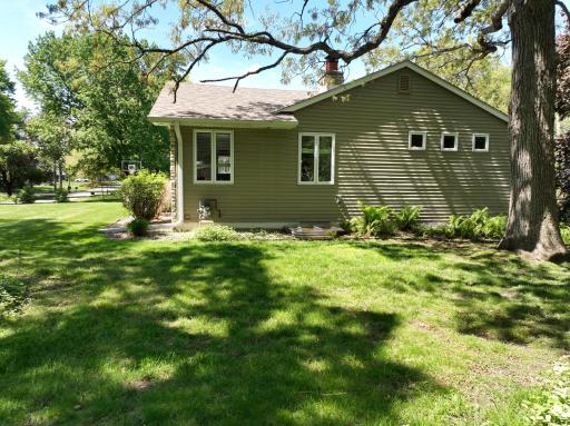 Side view of the home from its large private lot.