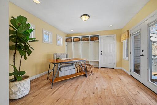 More than just a mudroom! With built-in locker storage and ample square footage, this room easily serves as an informal dining or hobby space. Conveniently located off the kitchen with plenty of room for everyoneâs gear and then some.