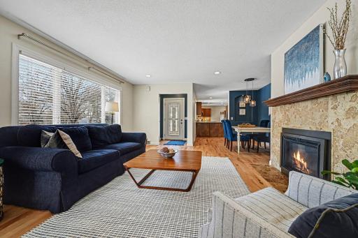 Perfect for hosting! The elegant living room flows into a formal dining area, creating an open, airy feel. From the decorative glass entry to the spacious closet, this layout is designed for both style and convenience. A true Minnetonka gem.