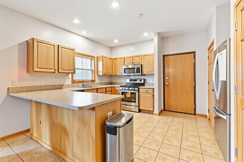 Unit 102 - Kitchen (AI Decluttered)