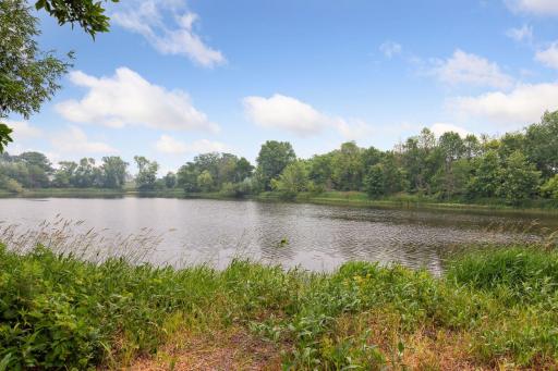Privacy, nature, and room to breathe â this lot delivers all three. Set against a tranquil pond and wetlands with walking trails winding through the landscape, it's a setting as special as the home itself.