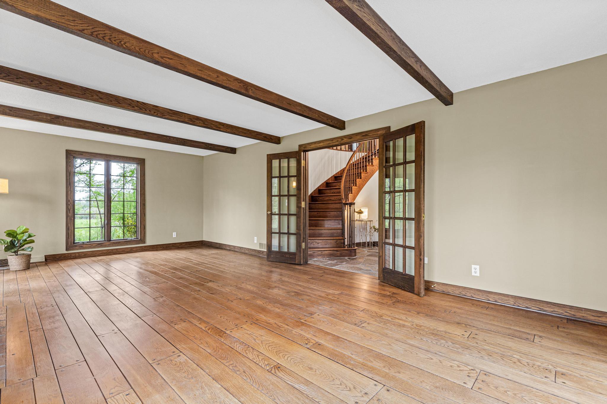 The perfect place to chat with friends, host a gathering or read a book. The formal living room provides picturesque views out every window.