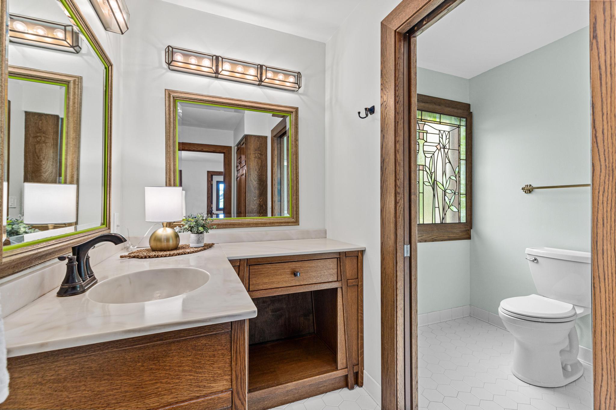 Upper level full bathroom. Private tub/toilet- separate from the vanity area.