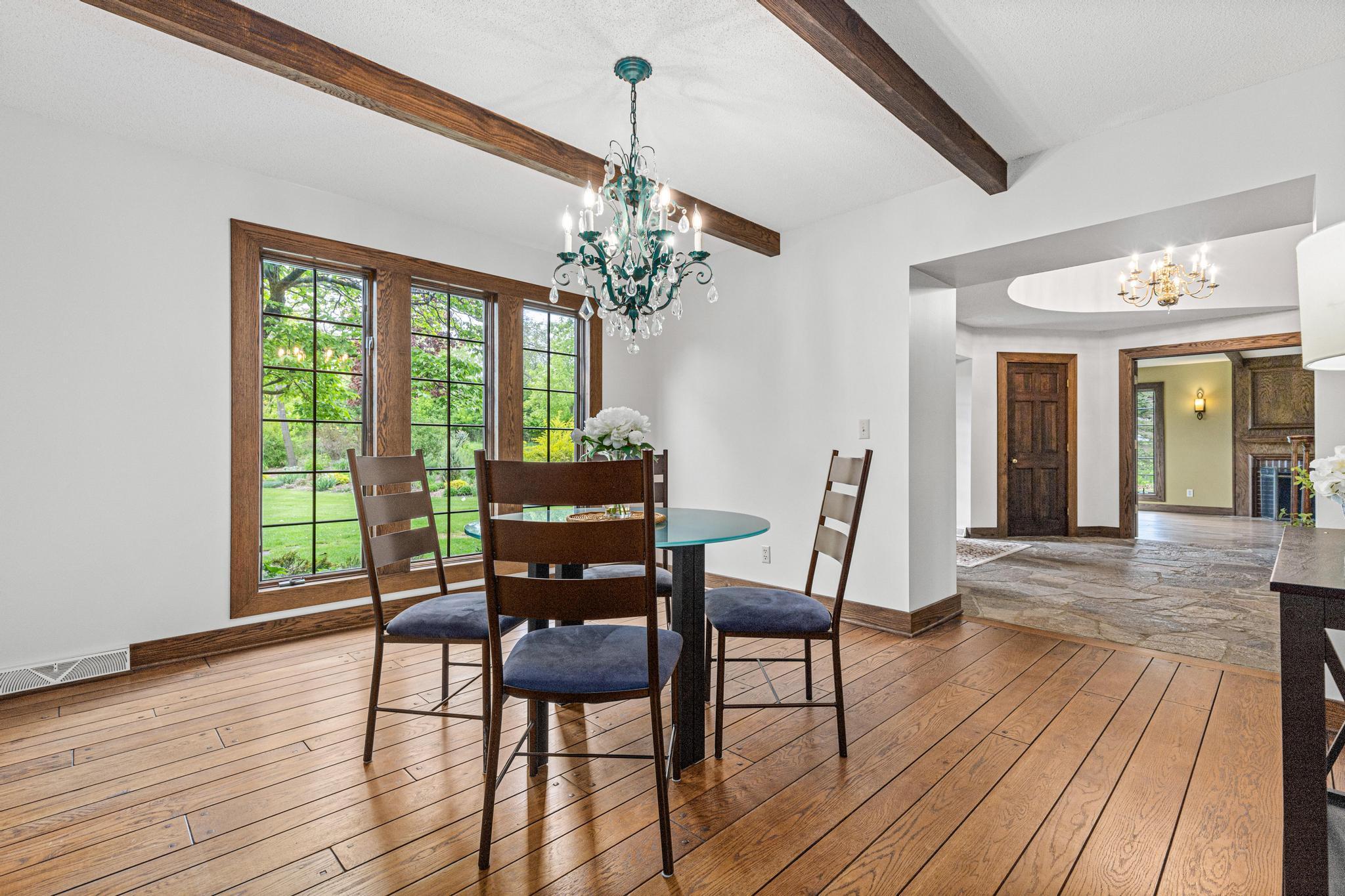 Spacious dining room is located off the kitchen and makes entertaining small and large groups a breeze. Host the holidays this year for family and friends. Incredible views out every window.