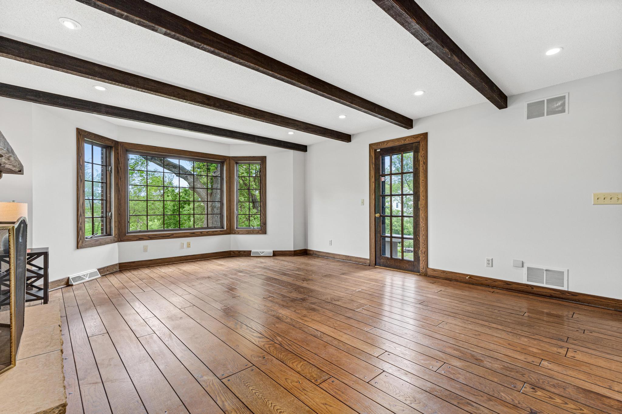 Family room is located off the kitchen and provides access to the patio.