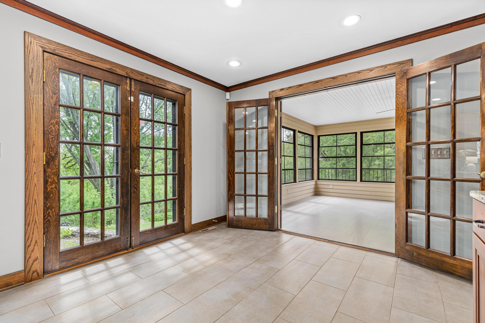 Informal dining area provides great flow to the screened porch and expansive patio.