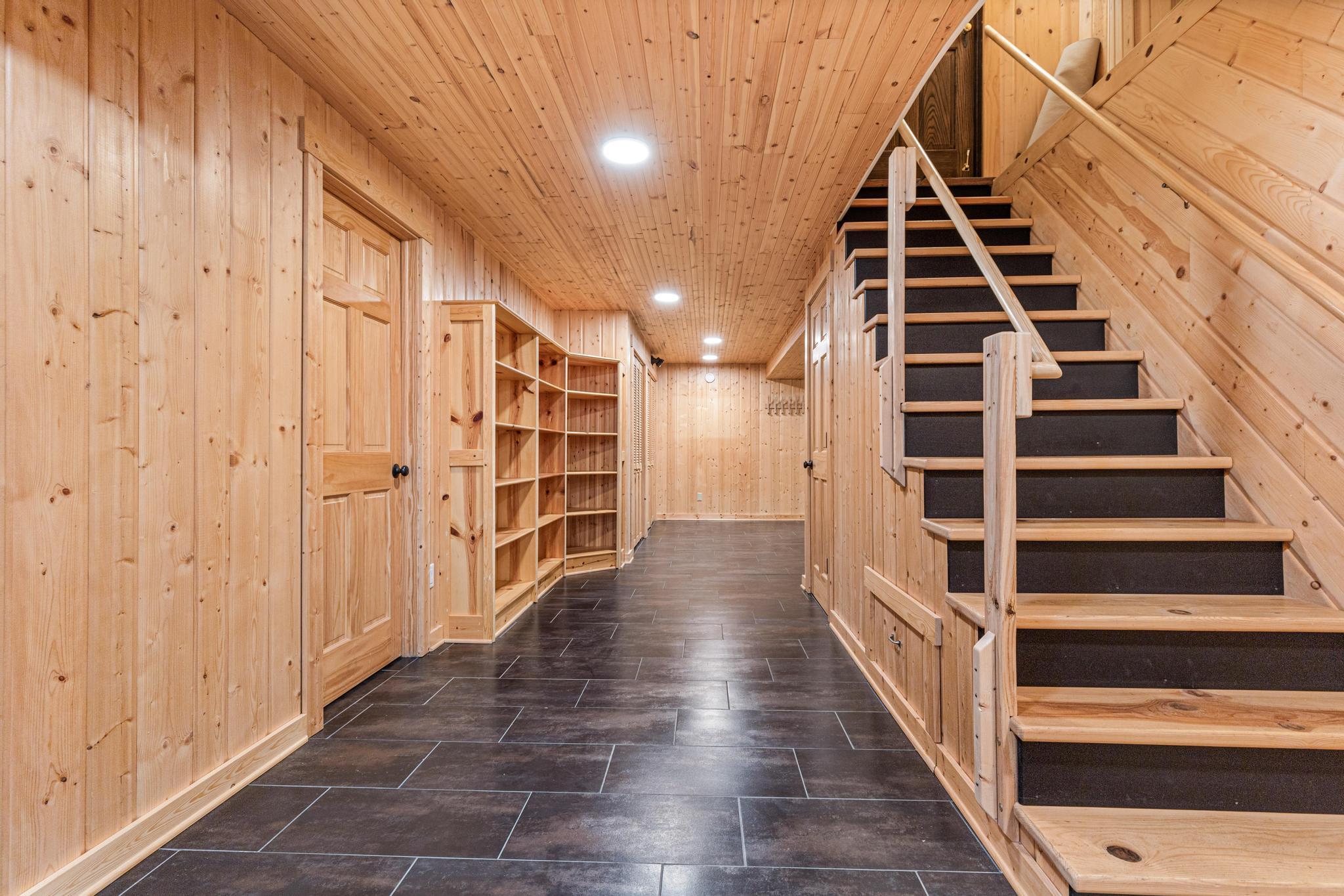 Tons of storage space when entering from the garage. Perfect for hockey equipment, canned goods and more. The best type of mudroom!