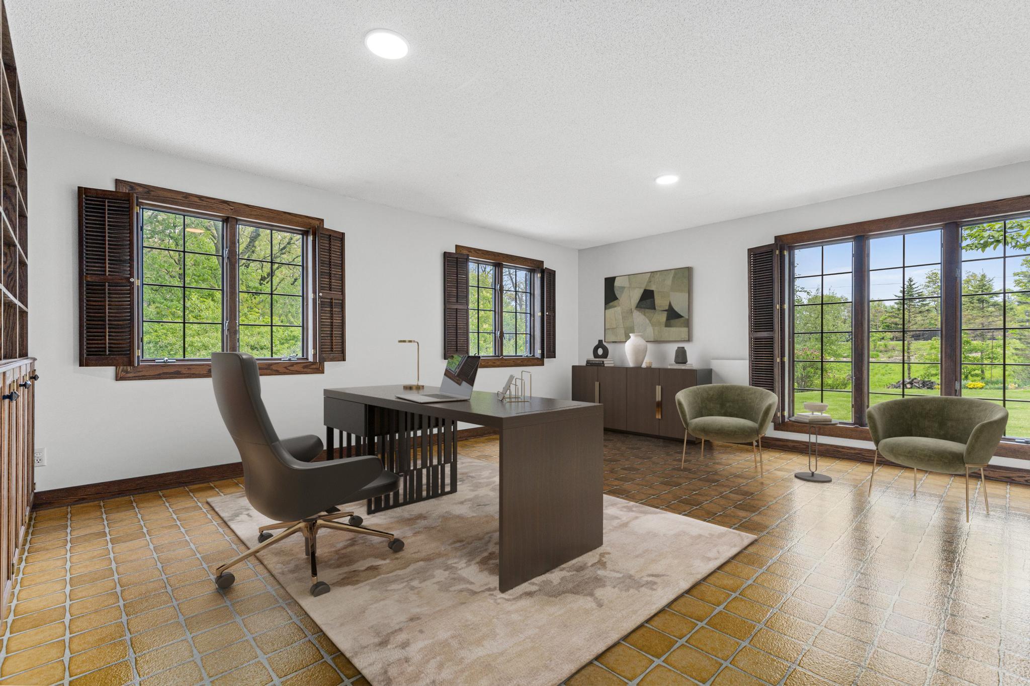Flexible craft room or home office ideal for today’s lifestyle needs. Visually staged.