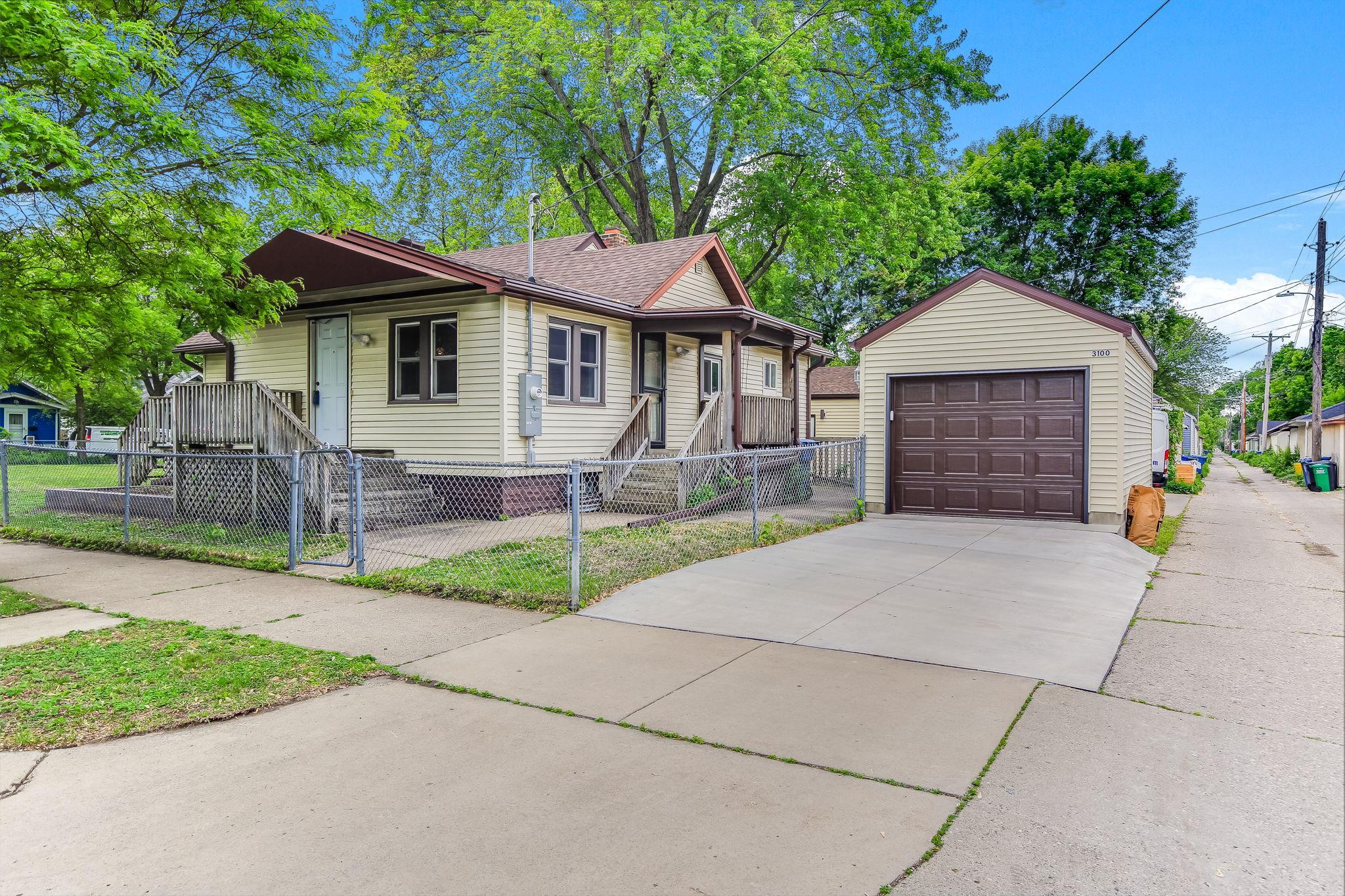 Nice corner lot with newer garage and concrete driveway!