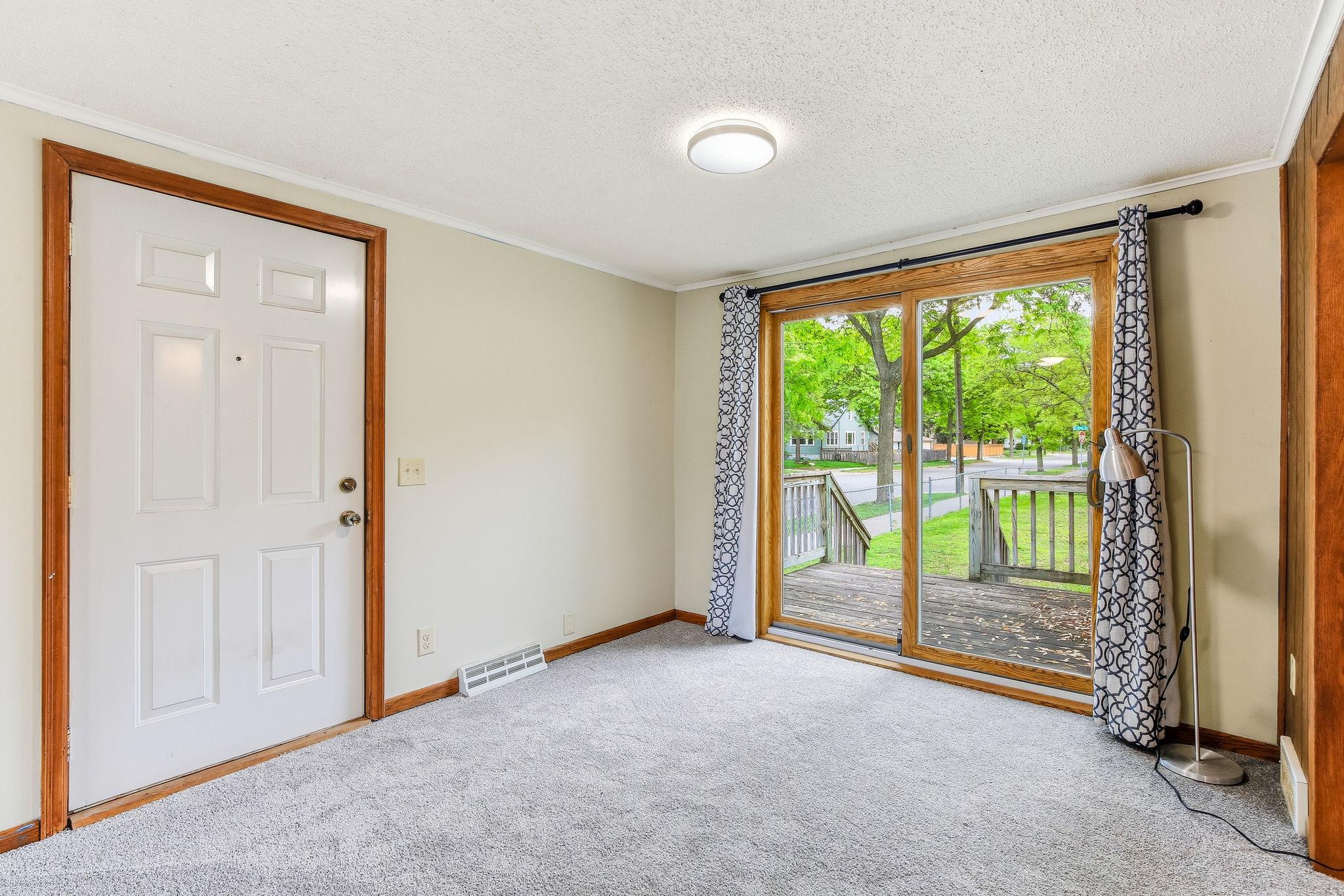 Another shot of the living room. Brand new carpet throughout!