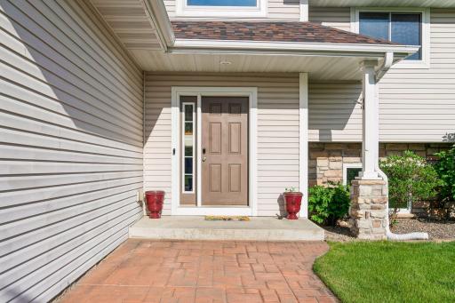 Large entrance to home with stamped concrete.