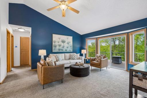 Nice size living room just off the kitchen with vaulted ceilings.