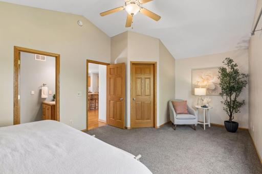 The master bedroom also includes vaulted ceilings a walk in closet and tons of natural light from the large window.
